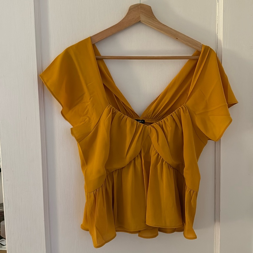Golden color blouse. Brand new.